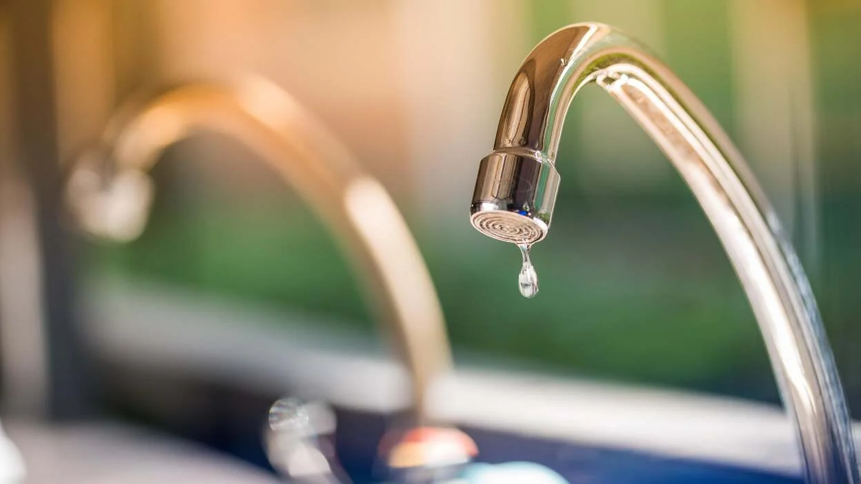 A water faucet with a slow drip